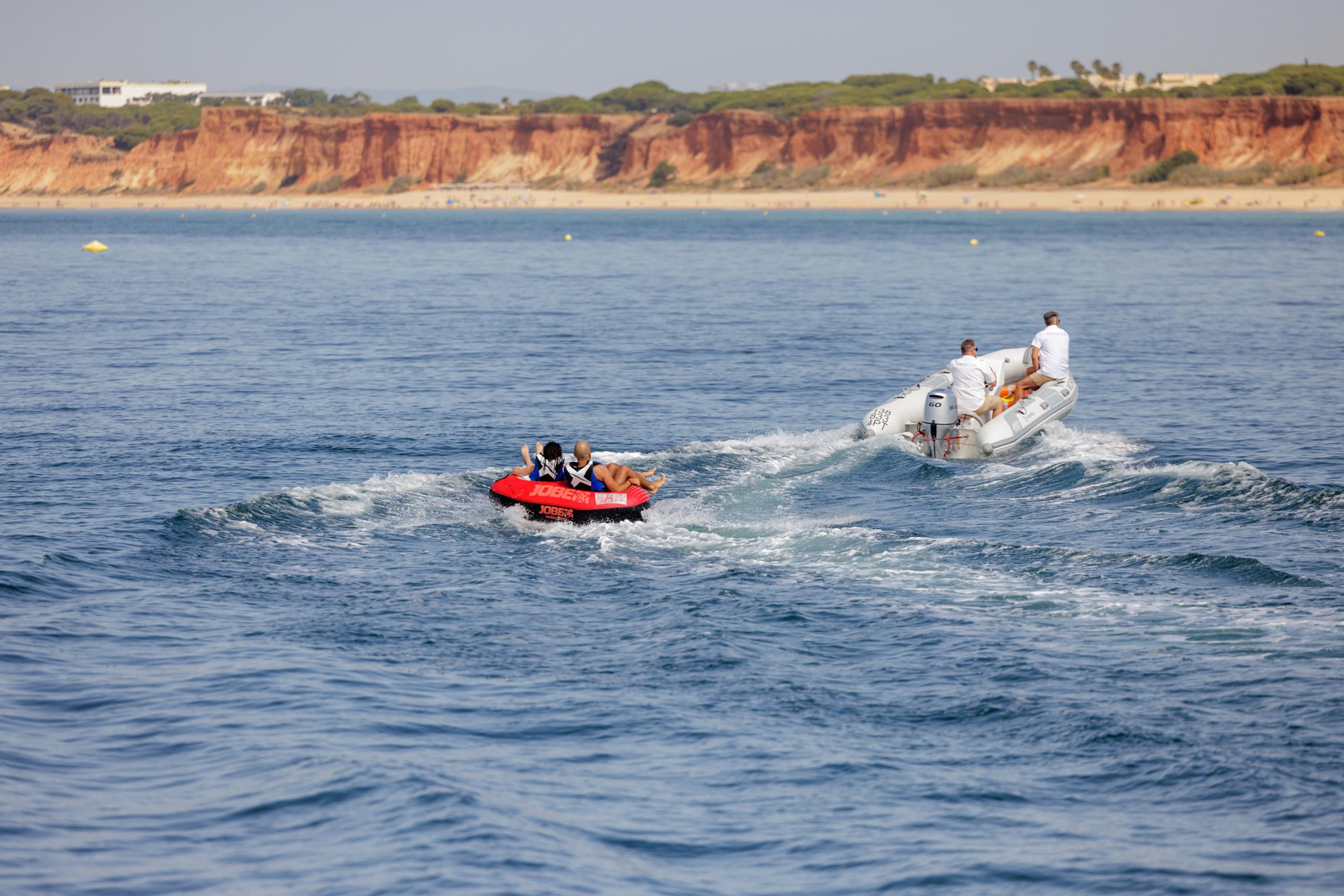 Private catamaran, cliffs and coastline